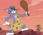 Tom Jerry ezmek için bir kulüp ile mağara adamı gibi giyinmiş